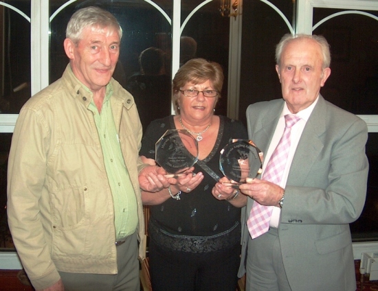 Founding members Patsy McCann and Norman Doherty receive their commemorative plaques from Anne Donnelly at last years 25th Anniversary Dinner Dance.